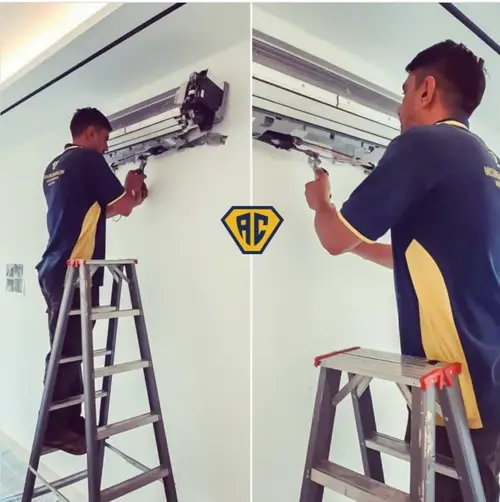 Juruteknik Aircon Hero sedang bekerja — servis aircond di Lembah Klang